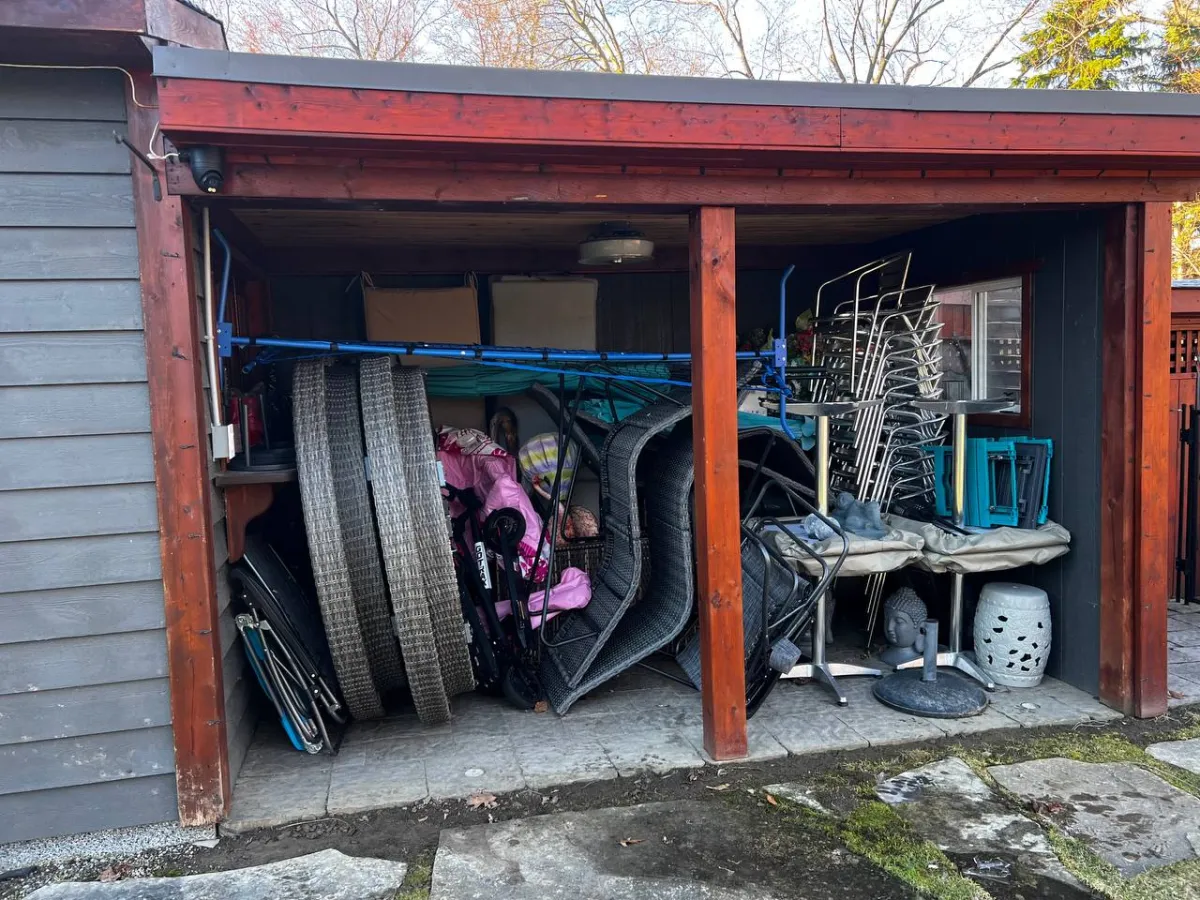 Cluttered outdoor storage area demonstrating security vulnerabilities and need for professional cabana protection solutions