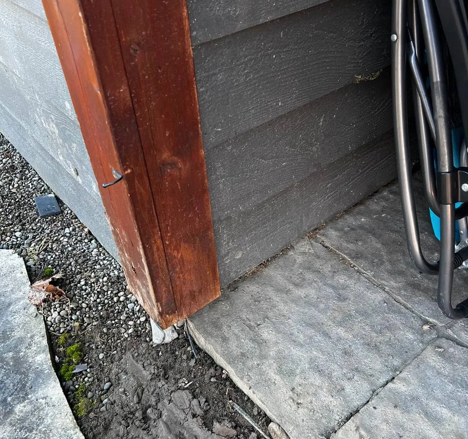 Weathered cabana door frame showing security vulnerabilities before shutter installation in Vaughan residential property